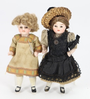 A pair of miniature all-bisque miniature dolls, German circa 1905