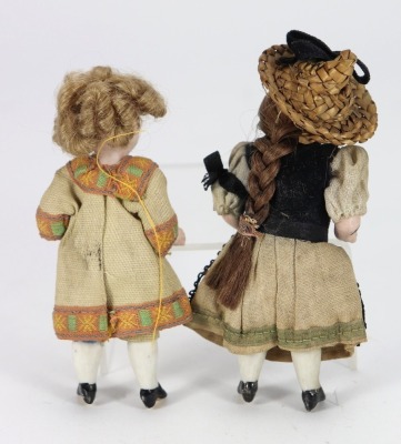 A pair of miniature all-bisque miniature dolls, German circa 1905 - 2