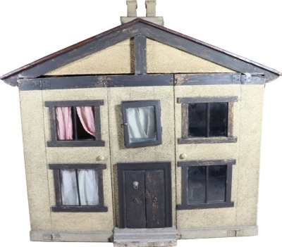 The 'Mc Rae' family dolls house and contents, 1920s, - 2