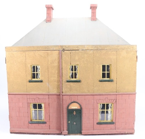 A painted wooden dolls house, English 1920s