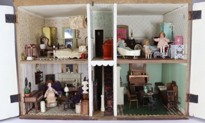 A painted wooden dolls house, English 1920s - 2