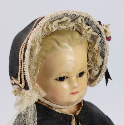 A wax over composition all original Pumpkin head doll, German circa 1870 - 2