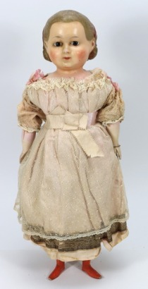 A poured wax Pumpkin head doll in original clothes, German circa 1870