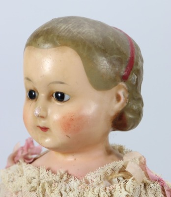 A poured wax Pumpkin head doll in original clothes, German circa 1870 - 2