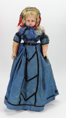 A good all original poured wax shoulder head doll, English circa 1860,