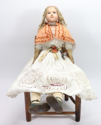 A large wax over composition shoulder head doll, English circa 1860, - 2