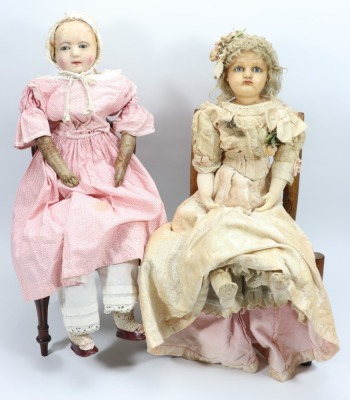 A large wax over composition shoulder head doll, English circa 1860