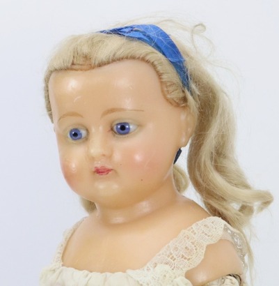A wax over composition shoulder head doll, German circa 1860,