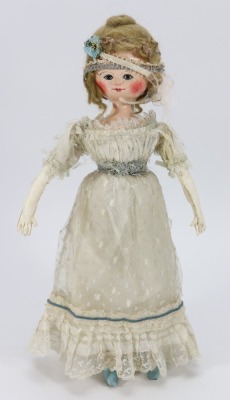 A large painted wooden peg doll, German circa 1890 - 2