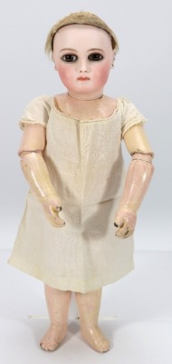 A rare Premiere portrait almond eye Jumeau bisque head Bebe doll, French circa 1880,