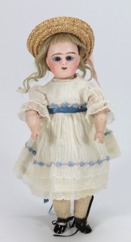 A rare small Eden Bebe bisque head doll, size 4, French circa 1900,