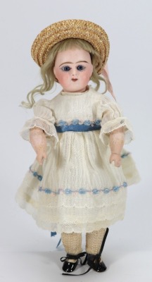 A rare small Eden Bebe bisque head doll, size 4, French circa 1900,