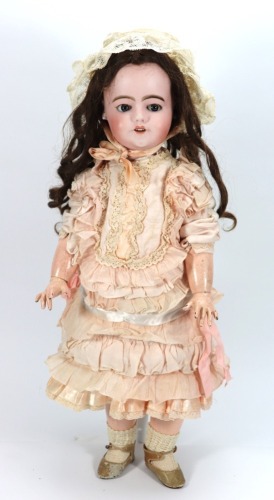 An S.F.B.J Depose bisque head doll with 'flirty eyes', French circa 1910,