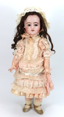An S.F.B.J Depose bisque head doll with 'flirty eyes', French circa 1910,