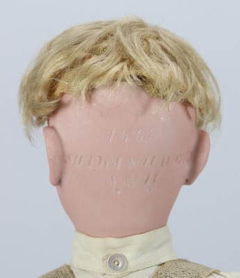 A rare Simon & Halbig 1448 bisque head character doll in original clothes, German circa 1912 - 4