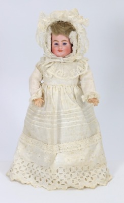A rare Carl Bergner all original three faced bisque shoulder head doll, German circa 1905