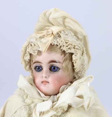 A rare small size all original Kestner 192 closed mouth bisque head doll, German circa 1890 - 2