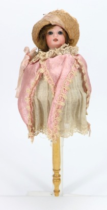 A Schoenau & Hoffmeister bisque head musical Marotte doll in jester costume, German circa 1900