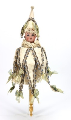 A Schoenau & Hoffmeister bisque head musical Marotte doll in original jester costume, German circa 1900