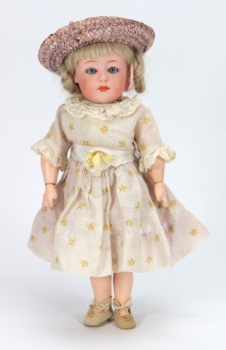 A rare small size Gebruder Heubach 7247 bisque head character doll, German circa 1910