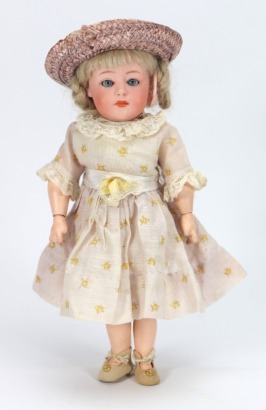 A rare small size Gebruder Heubach 7247 bisque head character doll, German circa 1910