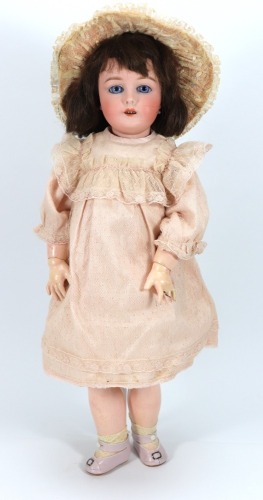 A Gebruder Kuhnlenz bisque head doll, German, (for the French market), circa 1910