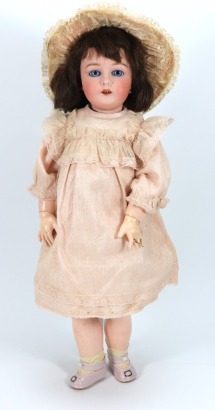 A Gebruder Kuhnlenz bisque head doll, German, (for the French market), circa 1910