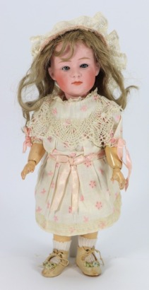 A rare glass eyed Gebruder Heubach 6970 bisque head character doll, German circa 1910,