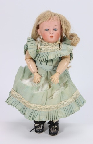 A rare glass eyed Gebruder Heubach 6870 bisque head character doll, German circa 1910,