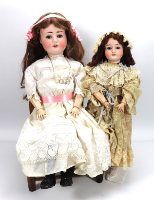 A Schoenau & Hoffmeister 1909 bisque head doll, German circa 1915