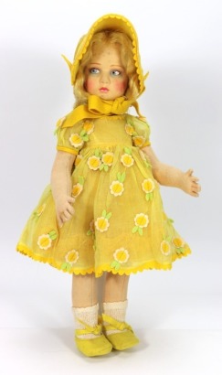 A Lenci felt girl doll in original yellow daisy clothes, Italian 1930s,
