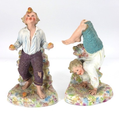 Gebruder Heubach pair of bisque performing boys, German circa 1900,