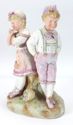 Gebruder Heubach bisque figurine young boy and girl, German circa 1900,