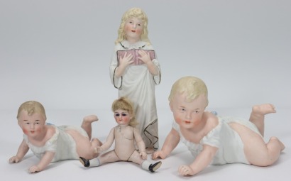 Two Heubach Piano Babies, German circa 1910