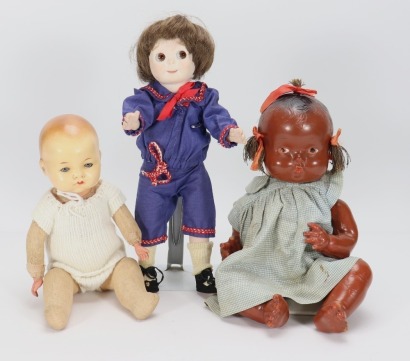 Two composition baby dolls and a reproduction 'Googly-eye' doll