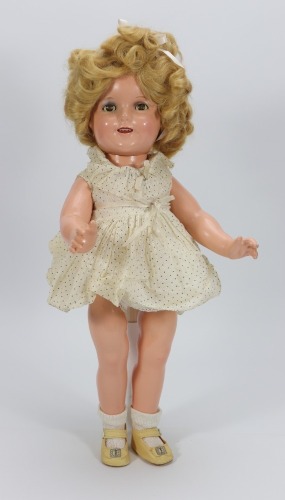 A Shirley Temple composition doll by ideal, American 1935-40