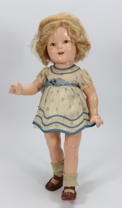 A Shirley Temple composition doll 'Curly Top' by ideal, American 1935-40