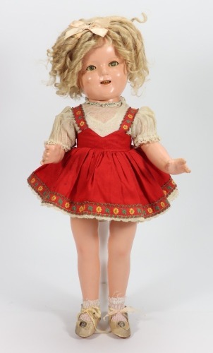 A Shirley Temple composition doll, by Ideal, American 1935-40