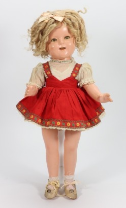 A Shirley Temple composition doll, by Ideal, American 1935-40