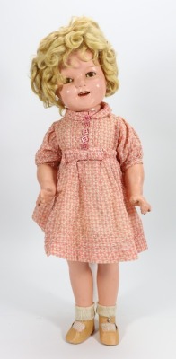 A Shirley Temple composition doll by Ideal, American 1935-40