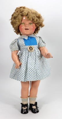 A Shirley Temple composition doll, by Ideal, American 1935-40