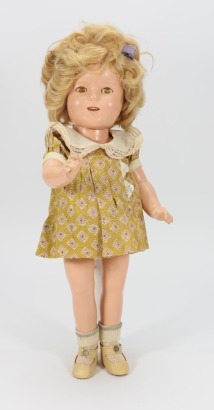 A Shirley Temple composition doll, by Ideal, American 1935-40