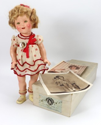 A Shirley Temple 'Stand up and cheer' composition doll in her original box