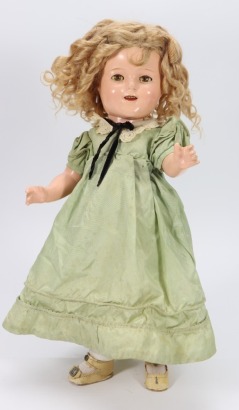 A Shirley Temple composition doll, by Ideal, American 1935-40