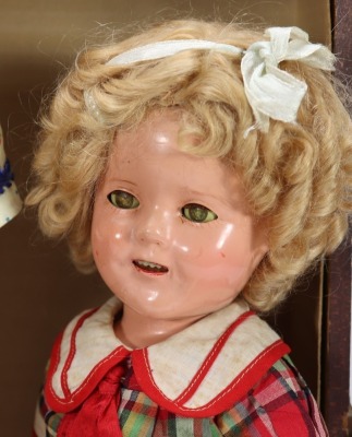 A Shirley Temple composition doll in her original travel trunk case with dresses and accessories, by Ideal, American 1935-40 - 2
