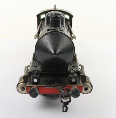 Marklin gauge I R1021 clockwork 0-4-0 locomotive and tender, with external cylinders, headlamps, cab with tin printed details, brake, forward/reverse levers and four wheel tender all finished in black livery with red, green and gold lining, good to very - 4