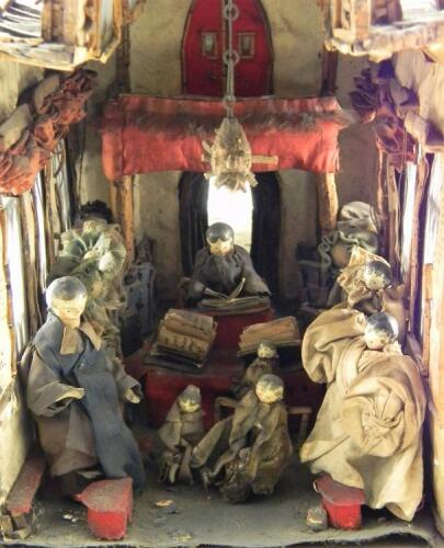 Rare and early cork model of a church with Grodnertal wooden dolls, circa 1825,