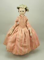 Early George II carved and painted wooden doll, English circa 1750,