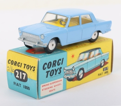 Vintage Corgi Toys 217 Fiat 1800, sky blue body, dark lemon interior, flat spun wheels, in near mint bright original condition, with an excellent yellow/blue original picture box, 2/6 in biro on one end flap, with Corgi model club leaflet.