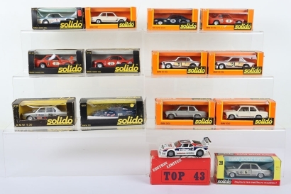 Thirteen Boxed Solido 1:43 scale BMW Models